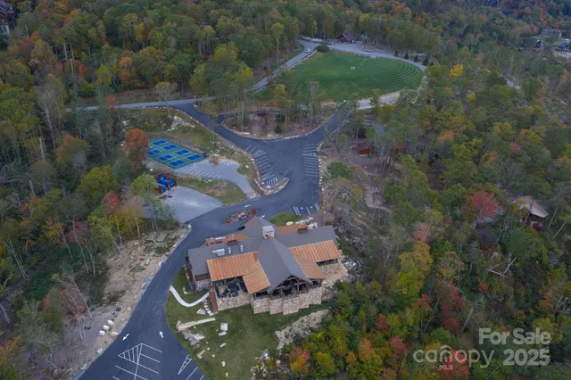 an aerial view of a house with outdoor space