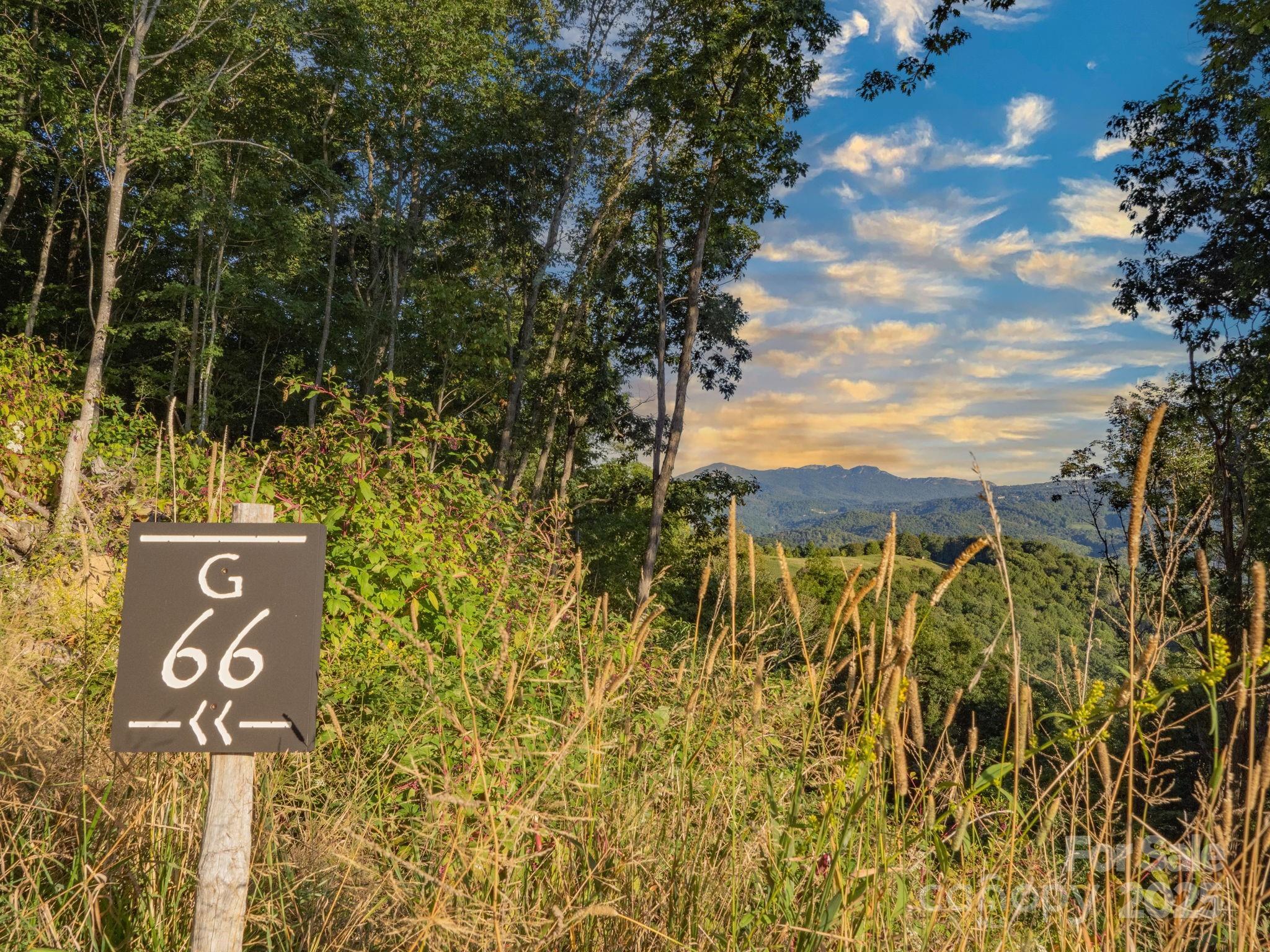 G-66 White Eagle Trail, Unit G66 Banner Elk, NC 28604 - Photo 2 of 24 a street sign that is on a pole