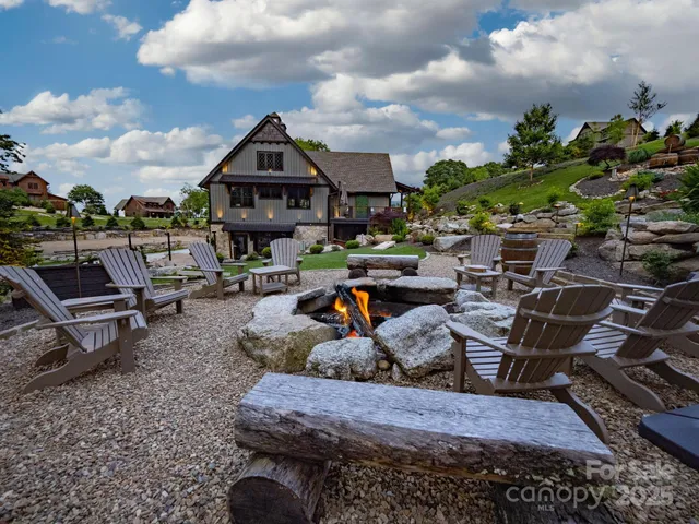 a view of a chairs and table in the patio