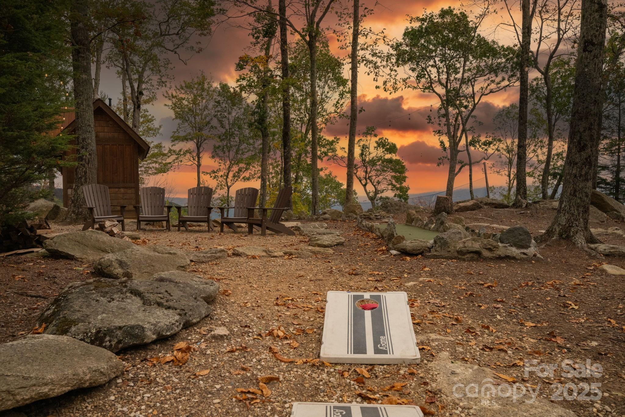 G-66 White Eagle Trail, Unit G66 Banner Elk, NC 28604 - Photo 23 of 24 a view of a tree with a yard
