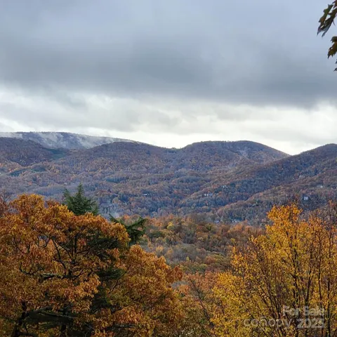 a view of an outdoor space and mountains