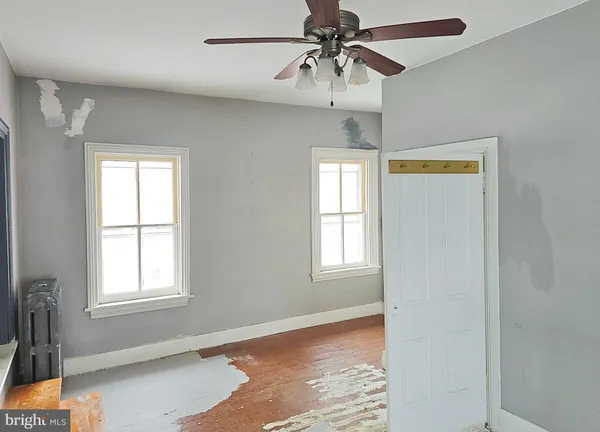 a view of an empty room and window