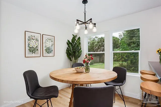 a kitchen with a refrigerator and a sink