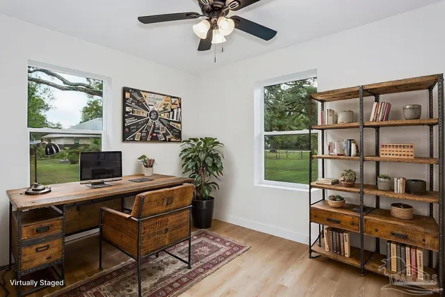 a view of a field with trees