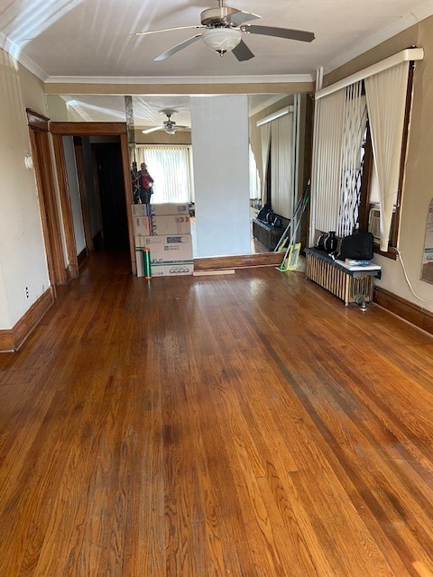 4022 West Cermak Road Chicago, IL 60623 - Photo 11 of 15 wooden floor and windows in a room