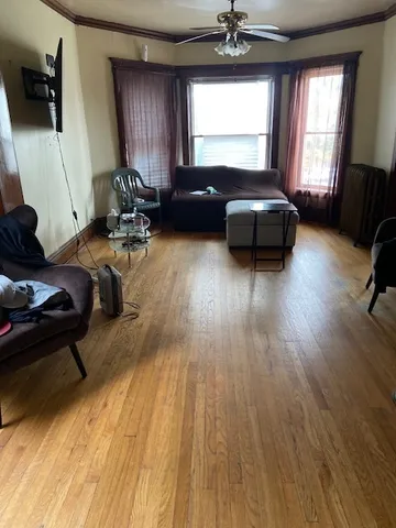 a living room with furniture and a window