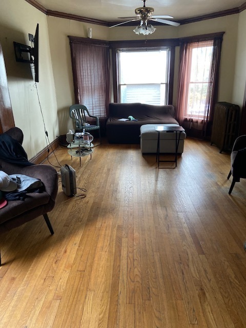 4022 West Cermak Road Chicago, IL 60623 - Photo 3 of 15 a living room with furniture and a window