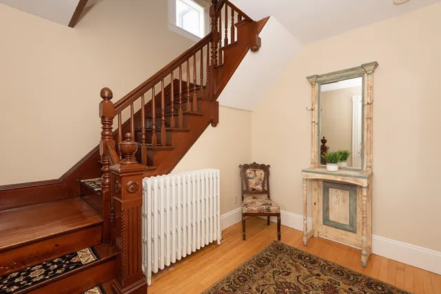 a view of entryway with wooden floor