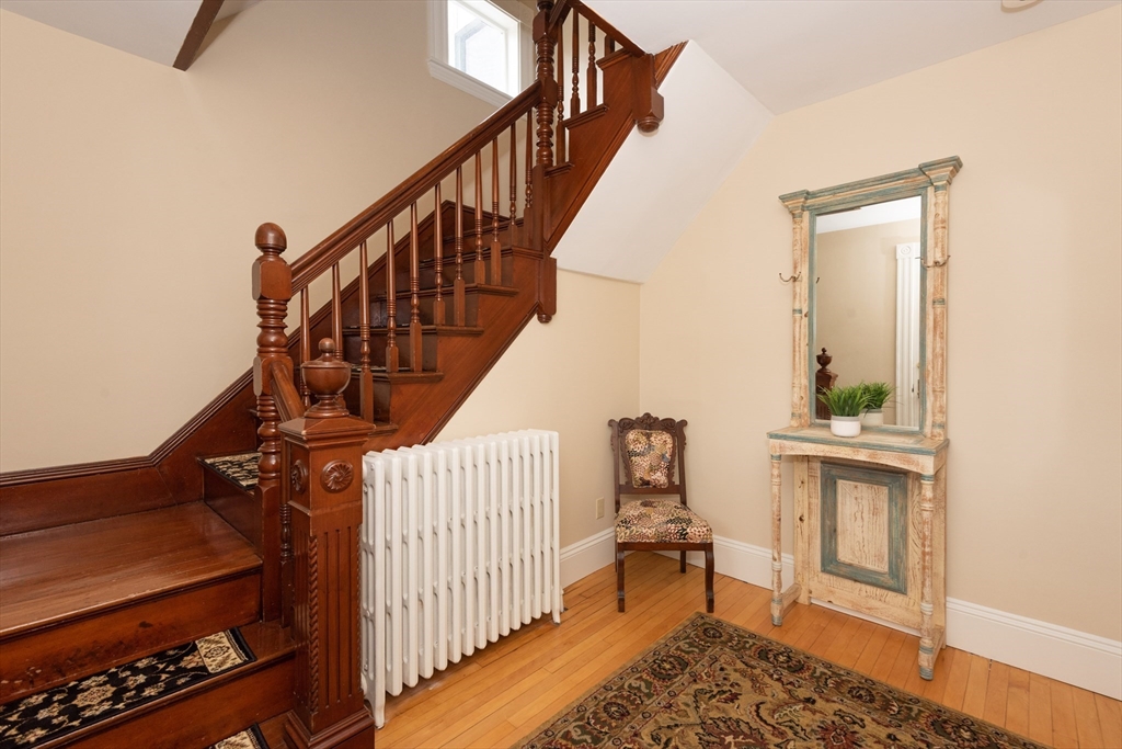 55 Linebrook Road, Unit 1 Ipswich, MA 01938 - Photo 4 of 25 a view of entryway with wooden floor