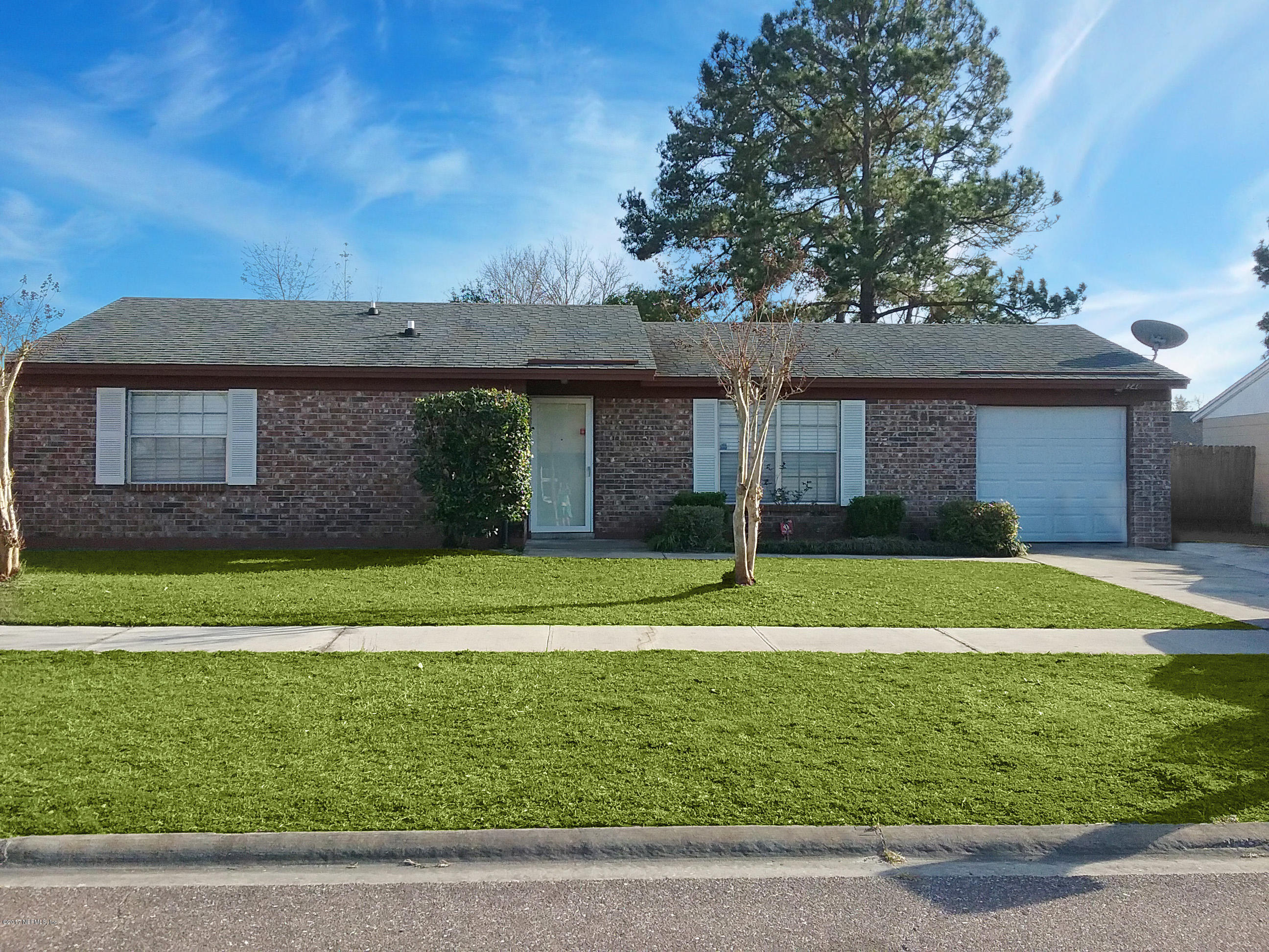 8248 Spring Lake Road North Jacksonville, FL 32210 - Photo 1 of 24 Well trimmed Front view