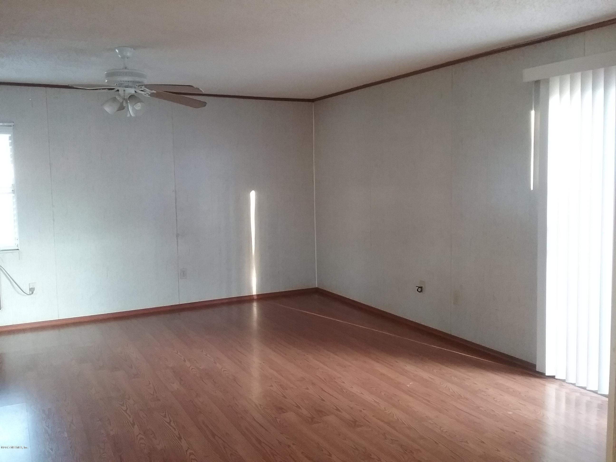 8248 Spring Lake Road North Jacksonville, FL 32210 - Photo 11 of 24 Spacious Family room