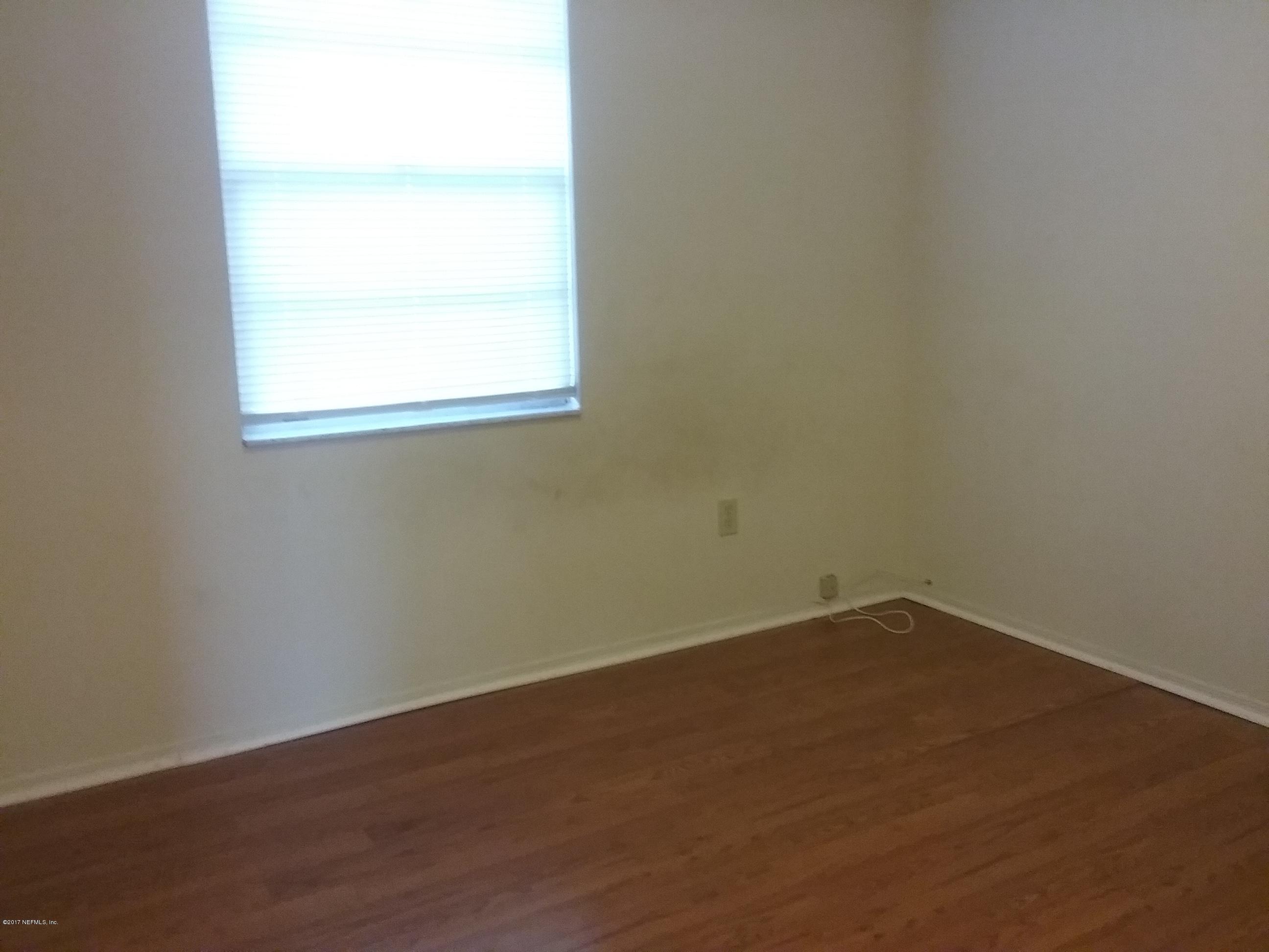 8248 Spring Lake Road North Jacksonville, FL 32210 - Photo 14 of 24 Master bedroom