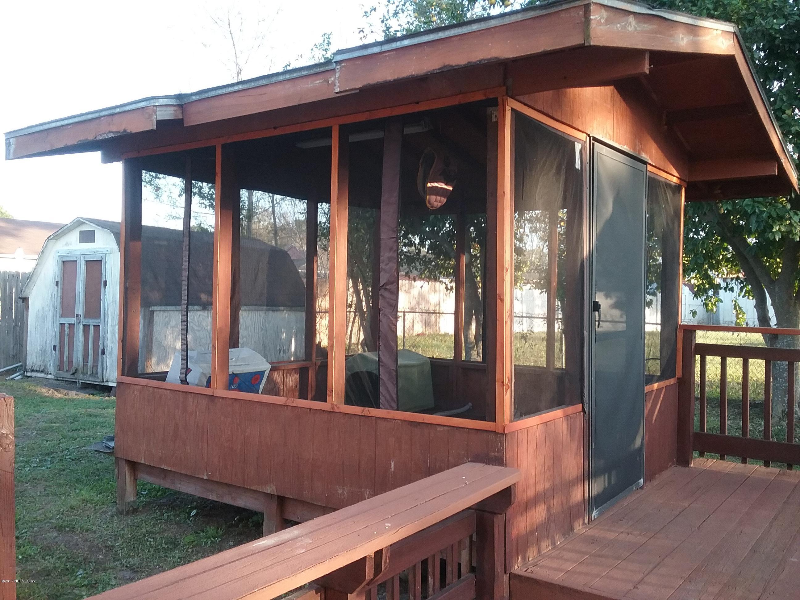 8248 Spring Lake Road North Jacksonville, FL 32210 - Photo 20 of 24 Screened back porch