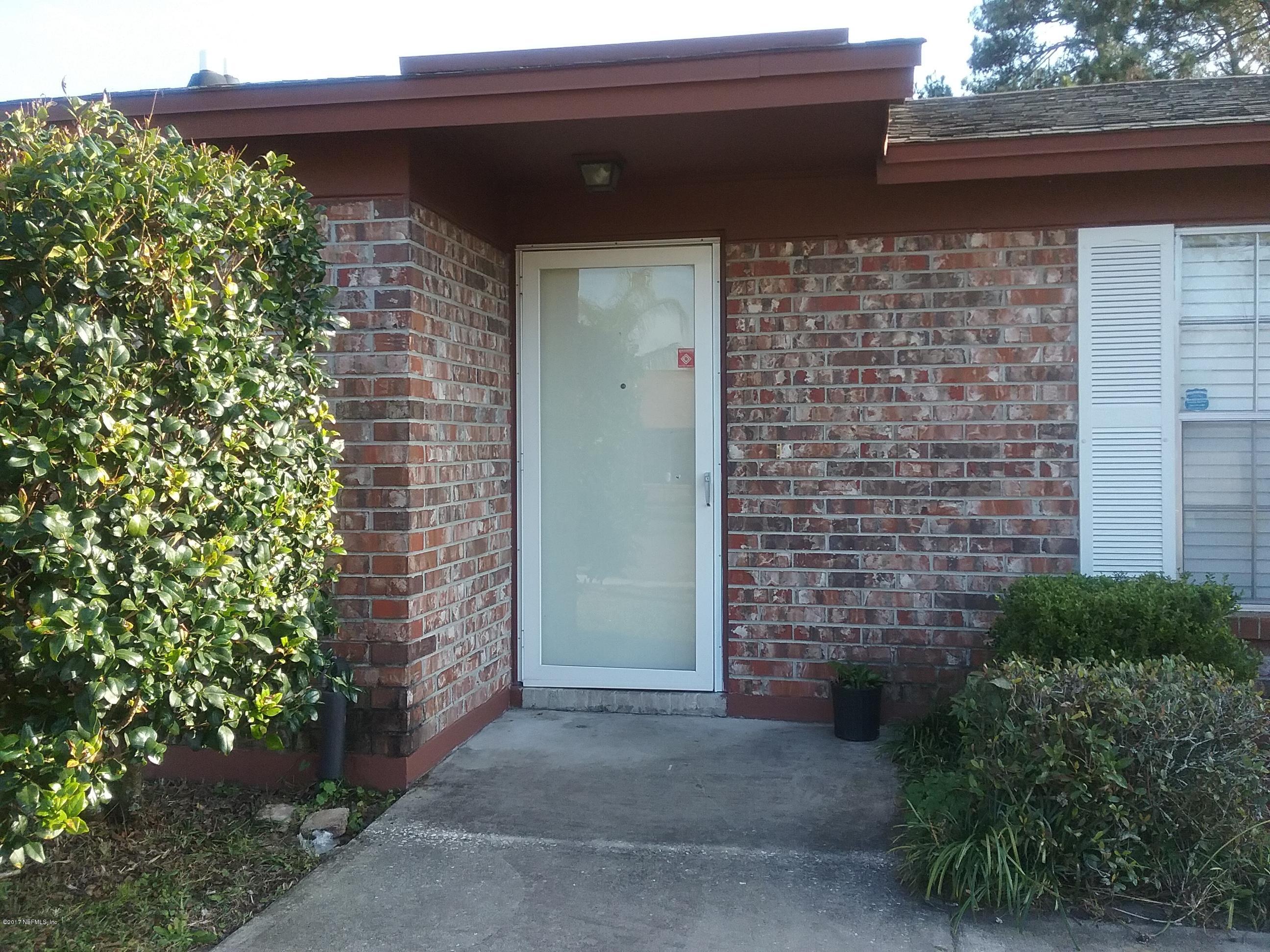 8248 Spring Lake Road North Jacksonville, FL 32210 - Photo 2 of 24 Front door