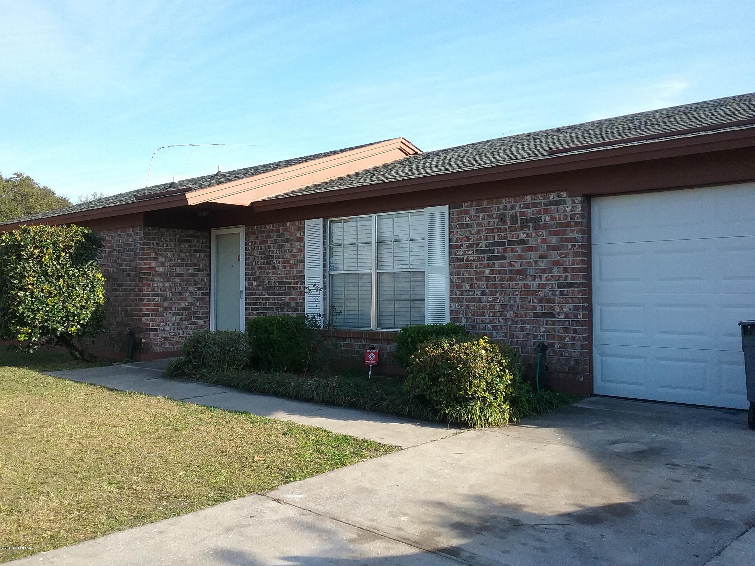 8248 Spring Lake Road North Jacksonville, FL 32210 - Photo 3 of 24 Front view with bricks