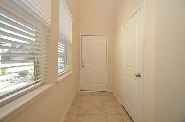 a view of a room that has a window in it