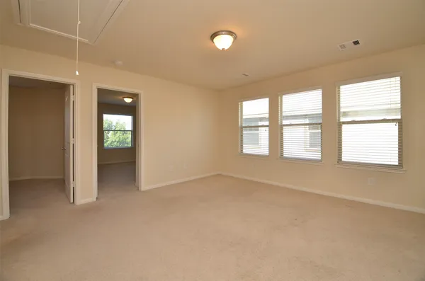 an empty room with windows