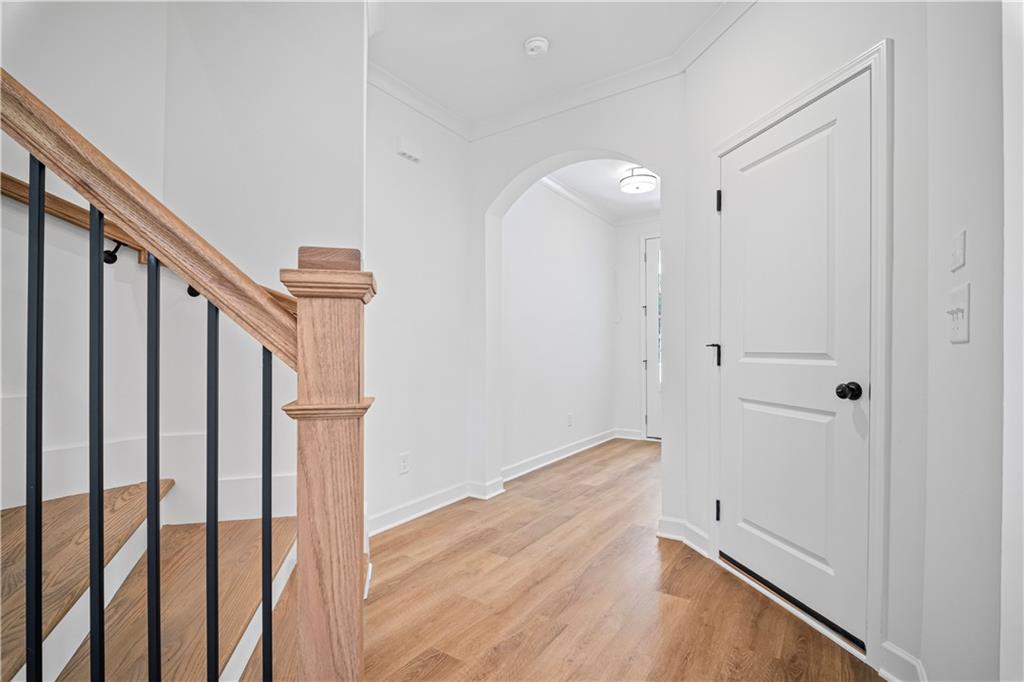 201 Retreat Lane Canton, GA 30114 - Photo 13 of 43 a view of a hallway with wooden floor and entryway