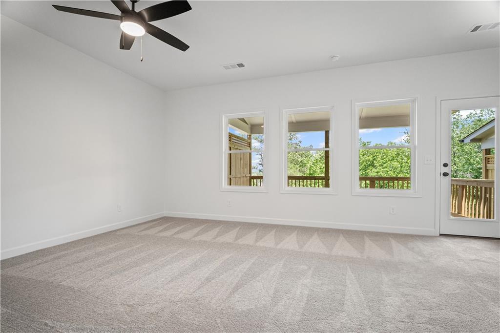 201 Retreat Lane Canton, GA 30114 - Photo 14 of 43 a view of an empty room with windows