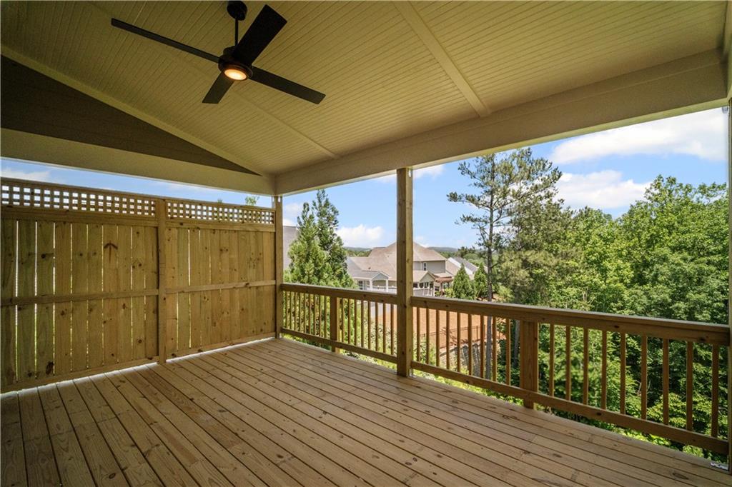 201 Retreat Lane Canton, GA 30114 - Photo 17 of 43 a view of a balcony with wooden floor
