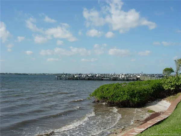 a view of a lake from a yard