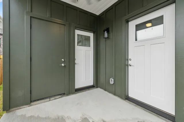 a view of balcony with wooden floor