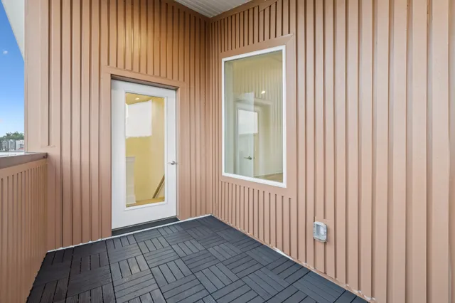 a front view of a house with garage