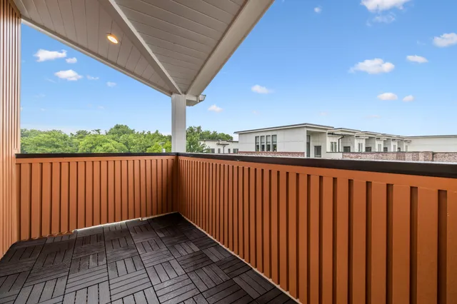 a aerial view of a house with a yard