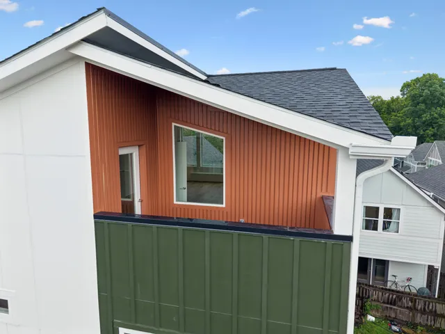 an aerial view of a house with a garden