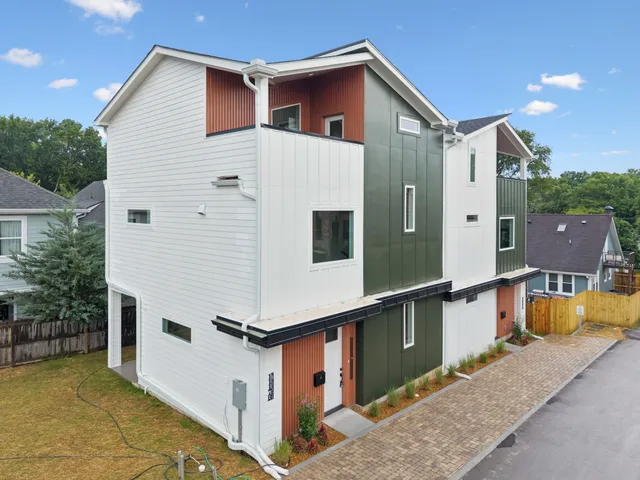 a view of a house with a street