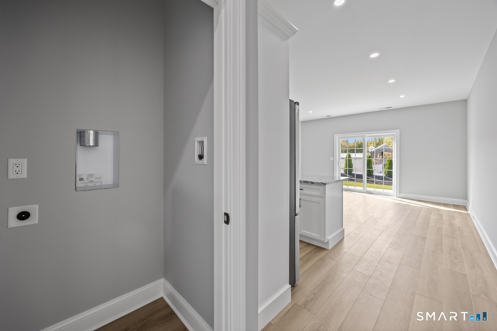 210 Munson Road, Unit 1B Wolcott, CT 06716 - Photo 6 of 28 Kitchen view from hallway