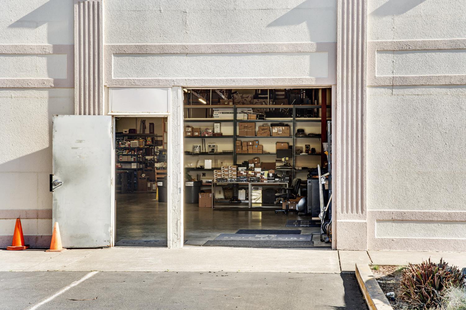 145 West 3rd Street Santa Rosa, CA 95401 - Photo 11 of 21 Roll up and door entrance to warehouse