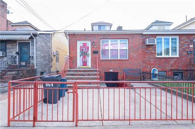 a front view of a house with a balcony