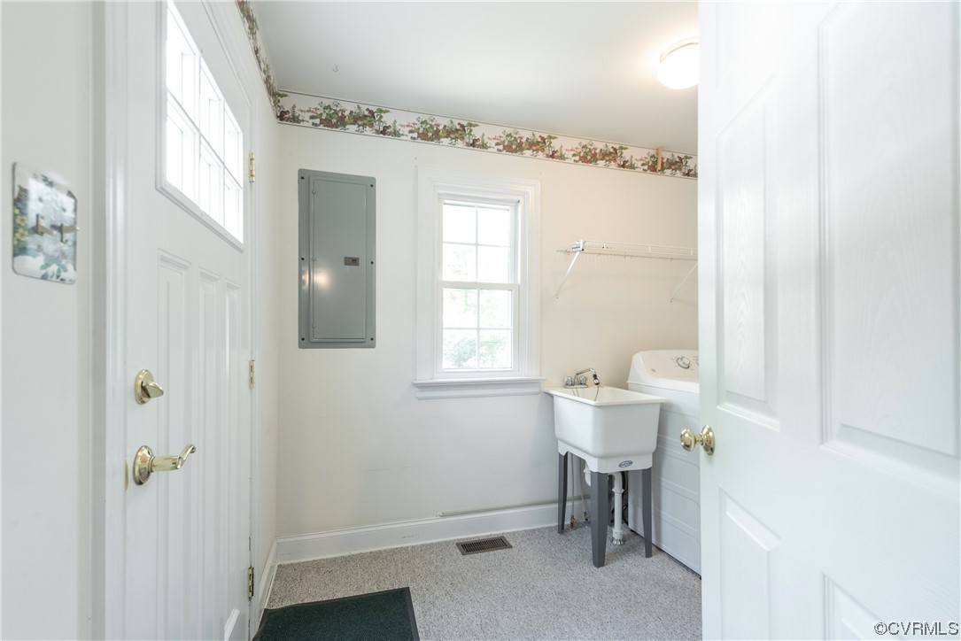 7508 Donder Road Richmond, VA 23294 - Photo 12 of 38 a bathroom with a sink and a mirror