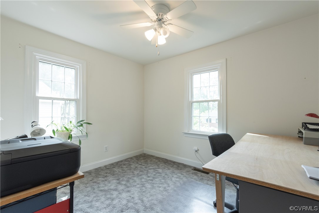 7508 Donder Road Richmond, VA 23294 - Photo 20 of 38 a view of a workspace with furniture and a window