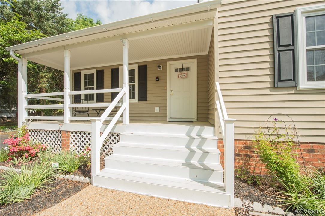 7508 Donder Road Richmond, VA 23294 - Photo 29 of 38 a front view of a house with a fountain