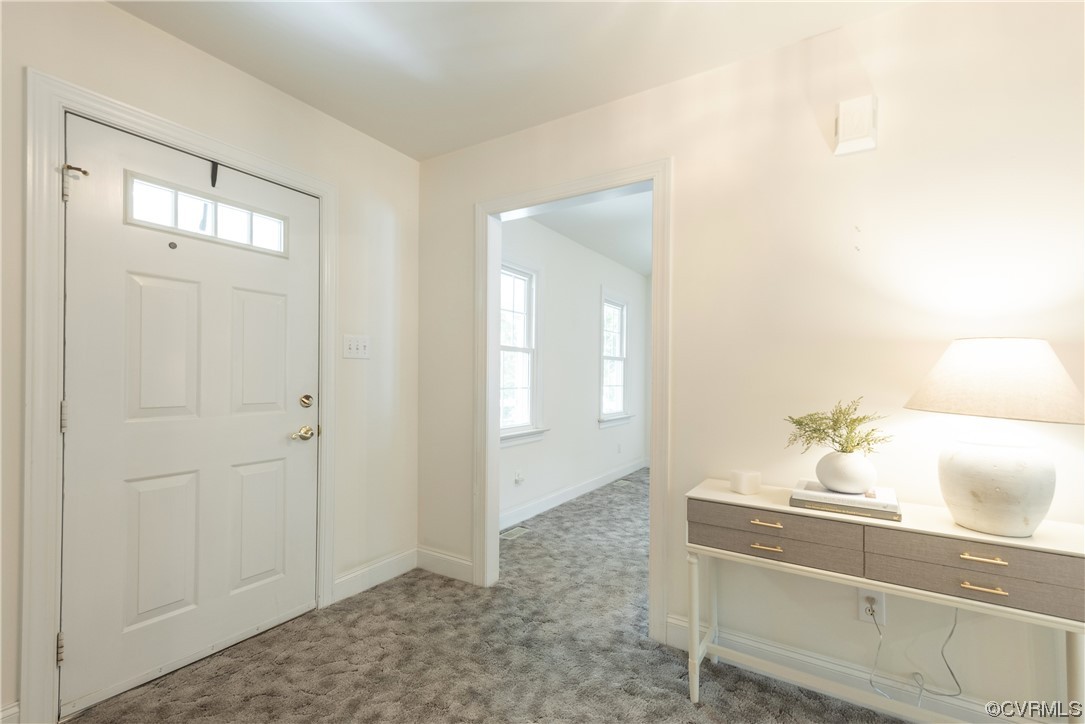 7508 Donder Road Richmond, VA 23294 - Photo 3 of 38 a bathroom with a sink and mirror