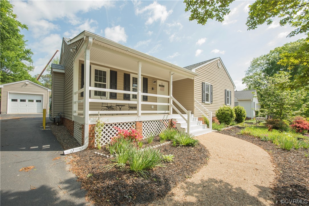 7508 Donder Road Richmond, VA 23294 - Photo 31 of 38 a front view of a house with a yard