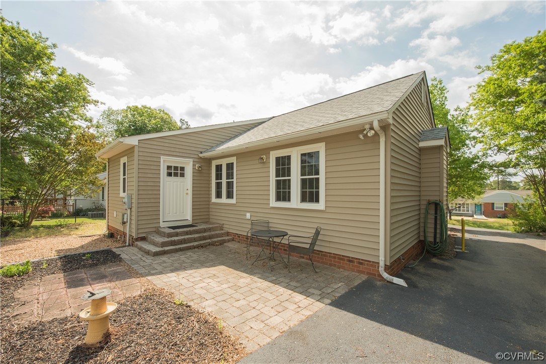7508 Donder Road Richmond, VA 23294 - Photo 35 of 38 a front view of a house with a yard