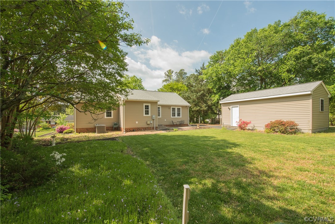 7508 Donder Road Richmond, VA 23294 - Photo 38 of 38 a front view of house with yard and green space