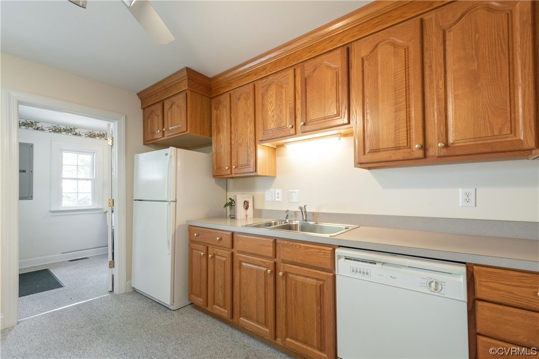 7508 Donder Road Richmond, VA 23294 - Photo 10 of 38 a kitchen with stainless steel appliances granite countertop a refrigerator sink and cabinets