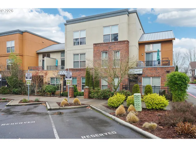 a city street lined with tall buildings