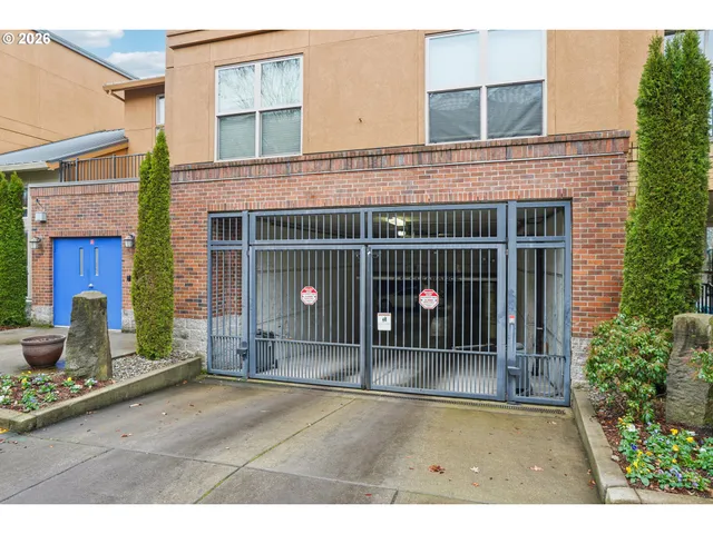 a view of a house with a wooden deck