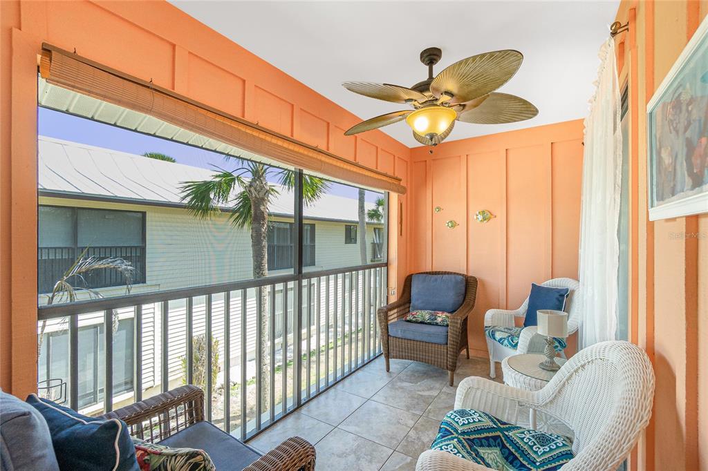 2450 North Beach Road, Unit 231 Englewood, FL 34223 - Photo 11 of 54 a living room with furniture and a window