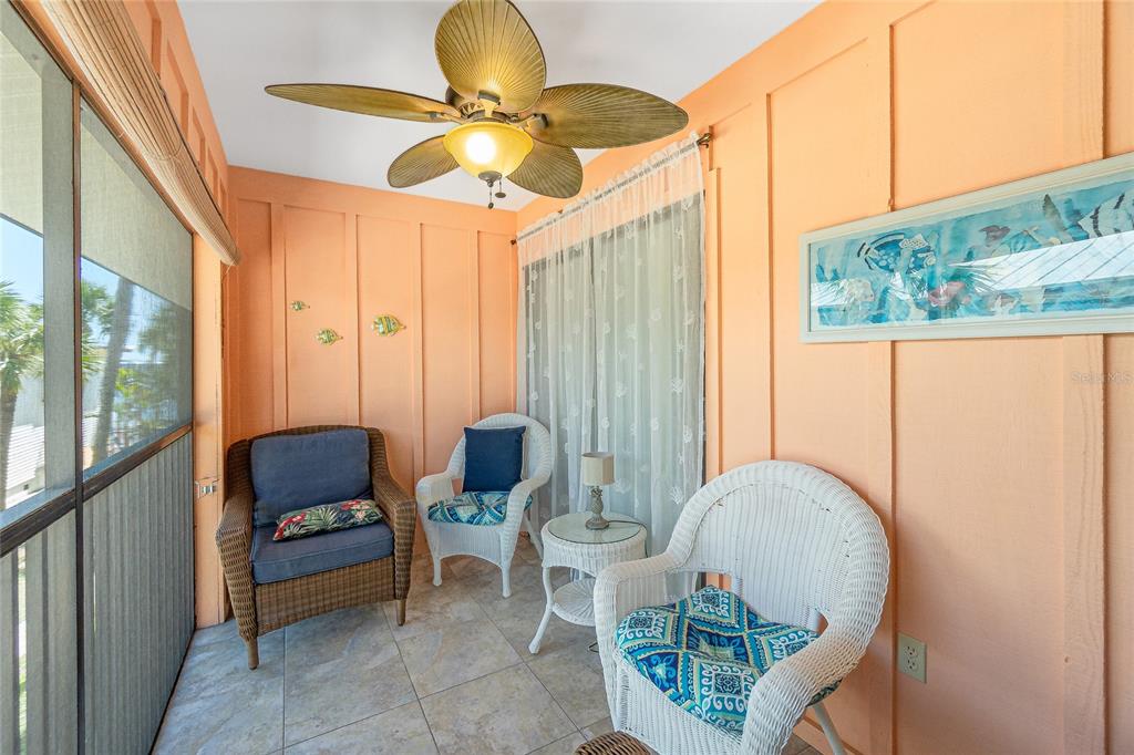 2450 North Beach Road, Unit 231 Englewood, FL 34223 - Photo 12 of 54 a outdoor space with couch