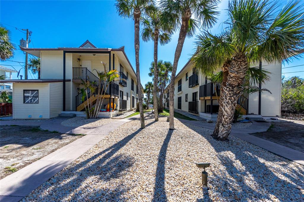 2450 North Beach Road, Unit 231 Englewood, FL 34223 - Photo 27 of 54 a view of a backyard with a slide