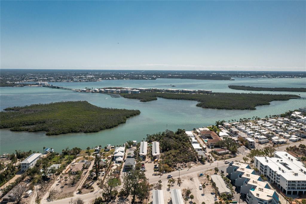 2450 North Beach Road, Unit 231 Englewood, FL 34223 - Photo 41 of 54 an aerial view of ocean and residential houses with outdoor space