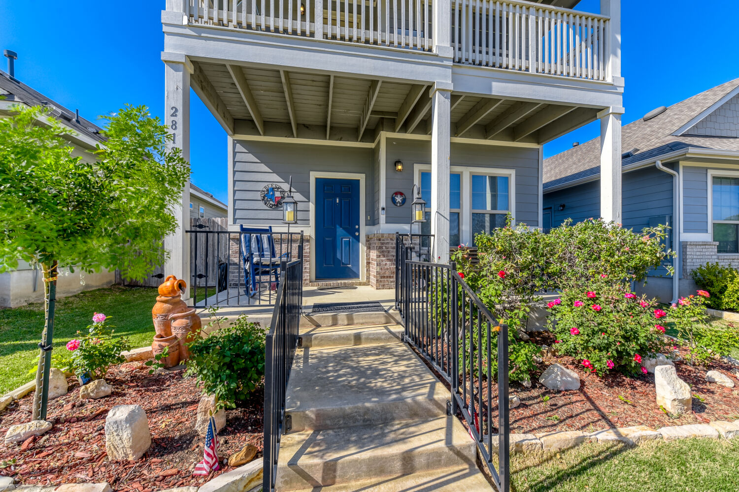 Doorway to property with covered porch