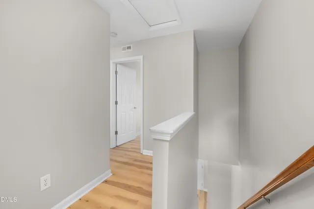 a kitchen with a stove and a refrigerator
