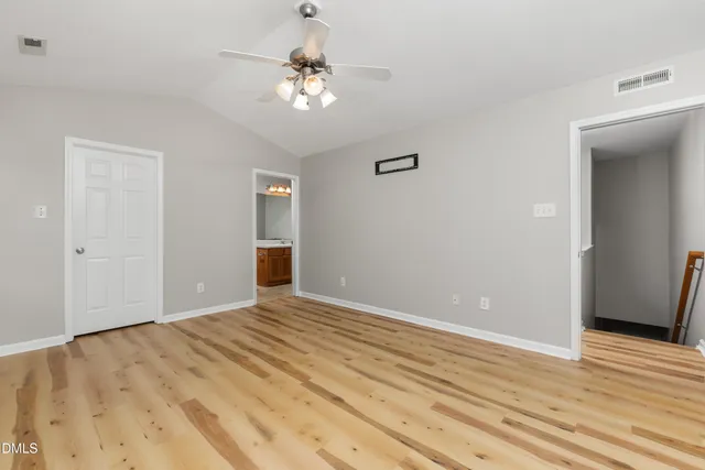 a bathroom with a sink a mirror and a toilet